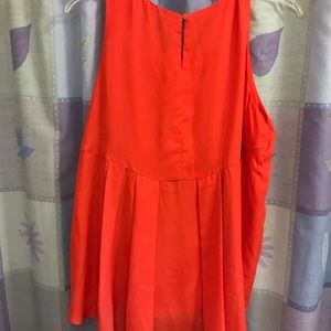 Sleeveless free flowing blouse